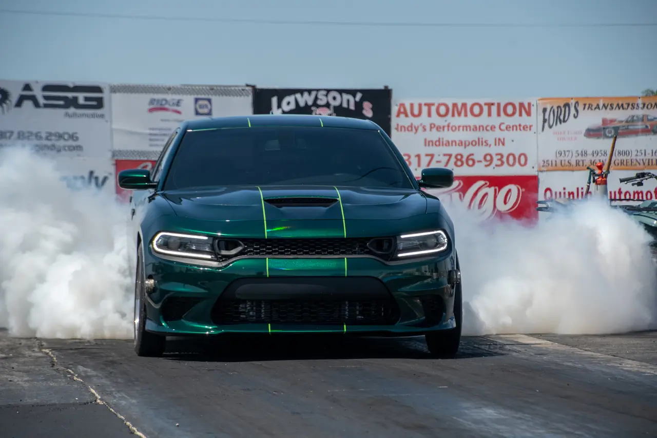 Satera Tuning 1500whp Charger Hellcat shop car doing a burnout at the drag strip