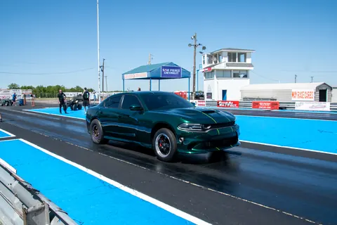 Satera Tuning 1500whp Charger Hellcat shop car rolling down the drag strip lane